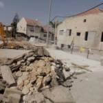 עבודות בנייה לשיקום נזקי השרפה ברחוב זלמן שזר