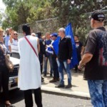 גמלאי המשטרה מפגינים בכבביר בחיפה מול ביתו של איימן עודה