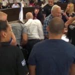 סערת הדגלי במהלך השידור החי של ישיבת מועצת העיר  חיפה (צילום: עיריית חיפה)