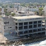 בניין הקזינו הנטוש בטיילת בת גלים בחיפה ממעוף הרחפן (צילום אוויר – מרום בן אריה – 054-869-4777)