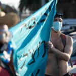 מיצג תנועת "XR – המרד בהכחדה" – טיילת בת גלים בחיפה (צילום: ירון כרמי)