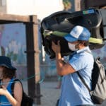 מורן בן-צבי ומערכת ההגברה – מיצג תנועת "XR – המרד בהכחדה" – טיילת בת גלים בחיפה (צילום: ירון כרמי)