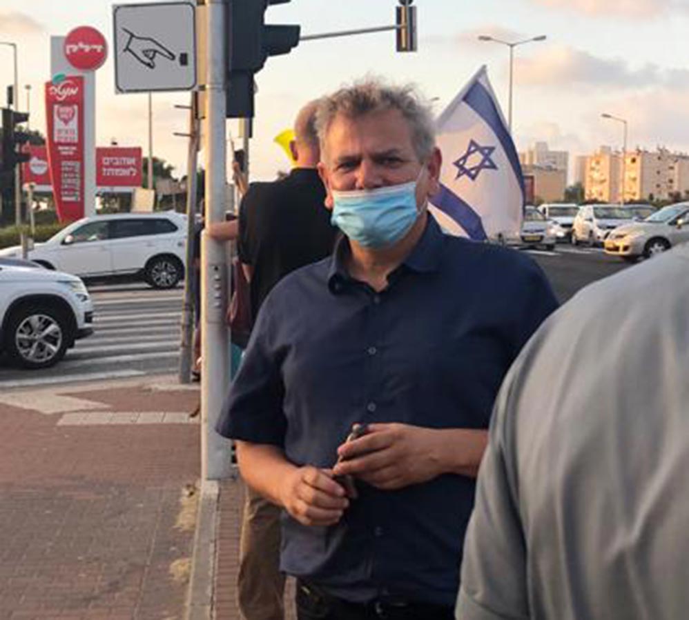 ח"כ ניצן הורוביץ בהפגנה בצומת מקסים בחיפה (צילום: ליאת מולכו)