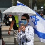 דגל ישראל בהפגנה – הדגלים השחורים בחיפה בעת ביקור נתניהו (צילום: חי פה בשטח)