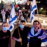 פעילי ימין מול מפגינים ערבים בהפגנה בחיפה למען שחרורו של העציר המנהלי מאהר אח׳רס (צילום: גרי קורן)