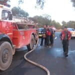 דני חייט עם אלדד ריבן ז"ל בעת השרפה בכרמל (צילום: דותן שגב)