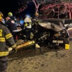 רכב מעוך – חילוץ אדם שנלכד ברכבו בתאונת דרכים בדרך פרויד חיפה (צילום: כבאות והצלה)