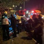 רכב מעוך – חילוץ אדם שנלכד ברכבו בתאונת דרכים בדרך פרויד חיפה (צילום: כבאות והצלה)