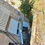 נהגת נפלה עם רכבה לתהום בחיפה (צילום: כבאות והצלה)