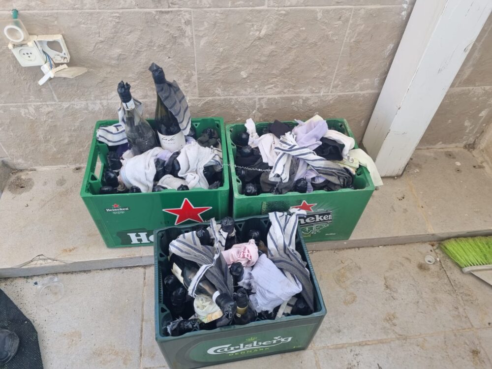 עשרות בקבוקי תבערה נמצאו בחיפה (צילום: משטרת ישראל)