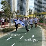 מיזם קהילתי בקריית מוצקין: רצים למען החטופים (צילום: אופק ברקוביץ׳)