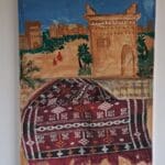 בבית גבי זהר – הציור 'מעשה בשטיח' אותו ציירה זהבית (צילום: רחלי אורבך)