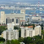 ממגורות דגון ונמל חיפה. ברקע חוף קריית חיים (צילום: שרון לייבל)