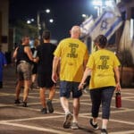 מיקרופון, חטופים, BringThemHomeNow, החזרה, כיכר, שלט, סרט, צהוב, תמיכה, הזדהות, קהילה, אירוע, מחאה, שקט, יחד, תקווה, ריכוז, מטה, תמונות, עצרת, הפגנה, חרבות ברזל, משפחות, מנהרה, מלחמה, אוקטובר, שלטים, רחובות, עיר, פוסטרים, לב, שבור, געגוע, עכשיו, דגלים, נאומים, קהל, במה, זעקה, שולחן, מדבקות, סטיקר, הביתה, חולצות, הפקרה, עיסקה, עסקה