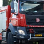 כבאי, כבאית, כבאות, כיבוי אש, שריפה, להבות, עשן, ציוד מגן, קסדה, מדים, צינור מים, מים, חום, סכנה, חירום, פעולה, הצלה, משאבת מים, זירה, פיח, צוות כיבוי, רכב כיבוי, חילוץ, חילוץ מגובה, חילוץ מרכב, חילוץ ממים, ציוד חילוץ, נשיאת פצועים, סנפלינג, מערכות נשימה, חדירה מבוקרת, חילוץ מיוחד, כבאות והצלה, מפגע, אשכול אש, חומרים מסוכנים, פריצה, סולם אש, זרנוק, הידרנט, מערכת גילוי אש, מערכת כיבוי אוטומטית, מניעת דליקות, בטיחות אש, חקירת שריפות, שיקום נזקי שריפה, מתנדב, תרגיל כיבוי, כוננות, אירוע רב נפגעים, אחראי בטיחות, הדרכה, רישוי עסקים, תקנות כיבוי אש, חדר בקרה, קצף כיבוי, שמיכת כיבוי, מטף כיבוי, עזרה ראשונה, פינוי, נקודת כינוס, קריסת מבנים, אש, כבאית, סולם, צוות, אורות, צופר, קורבן, פצוע, ריח, סירנה, קריסה, בטיחות