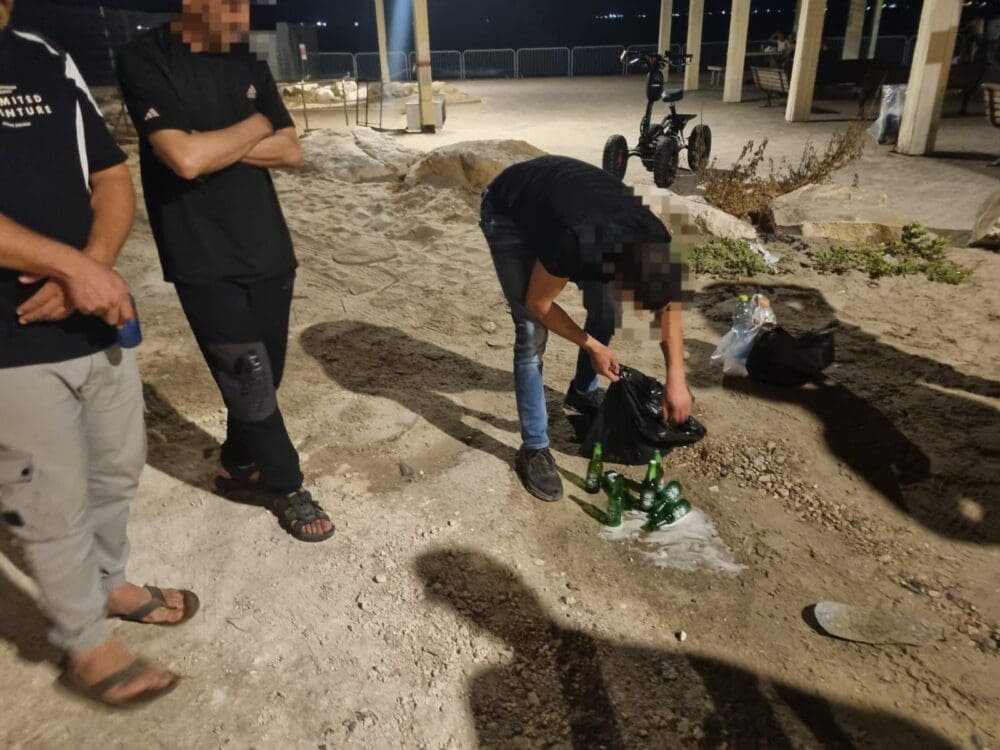 מבצע אכיפה בחוף (צילום: עיריית חיפה)