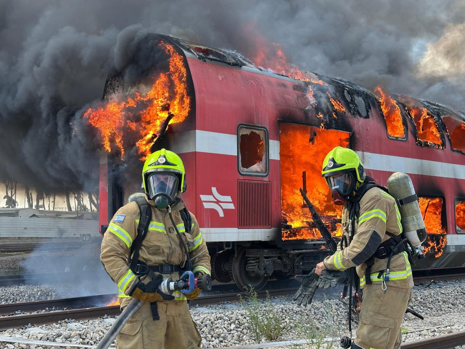 תרגיל משותף לכבאות והצלה וצוותי רכבת ישראל (צילום: כב