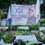 נתנאל אלקובי, אחיה דסקל, בוצחק, לוויה צבאית, חיפה, ישראל, חייל, הלוויה, כבוד, דגל ישראל, קבורה צבאית, בית עלמין צבאי, מדים, ארון קבורה, מסע הלוויה, זיכרון, שבר, שתיקה, אבל, רובה, רובים, נשק, חיילים, עמידה, מסדר, דום, הנפת דגל, דממת כבוד, נעימת אל חנן, כיתת יורים, קצינים, משפחה שכולה, אזרחים, פרחים, זר פרחים, אנדרטה, קבר, חלל, חללים, מלחמה, קרב, נפילה, נפלו, נפל, עצמאות, מדינה, משמרתם, מטח כבוד, מצבה, מצבות, אמא, אבא, גבעתי, צה״ל, גיבור, דגלים, יחידה, יחידות, גולני, צנחנים, נח"ל, כפיר, חטיבת הקומנדו, סיירת מטכ"ל, שייטת 13, יחידת שלדג, שריון, תותחנים, הנדסה קרבית, חיל האוויר, חיל הים, מודיעין, פיקוד העורף, תקשוב, עצב, יגון, כואב, געגוע, הערכה, גאווה, תנחומים, תקווה, התייחדות, כאב לב, שותקים, בוכה, דומעים, עם ישראל, הלב נשבר, שכול, גיבורים, מורשת, הקרבה, נצח, מגן, חוסן, דורות, עתיד, גבורה, אומץ, מסירות, נחישות, מורשת קרב, אחוות לוחמים, ציונות, שבועה, הבטחה, נצח ישראל לא ישקר, דמעות, כאב, צער, זיכרון עולם, לעד, בלבנו, נזכור, לא נשכח, אחינו, אחיותינו, תפילה, יזכור, שירות, גיוס, השתמטות, משתמטים, אזכרה, צוק איתן, חרבות ברזל, מבצע, עזה, לבנון, אירן, איראן, מלחמות, חגורה שחורה, מגן הצפון, חיצי הצפון, עלות השחר, מגן וחץ, עם כלביא, צפירה, טקס, טקס צבאי, הספד, פיגוע, טרור, מחבלים, חמאס
