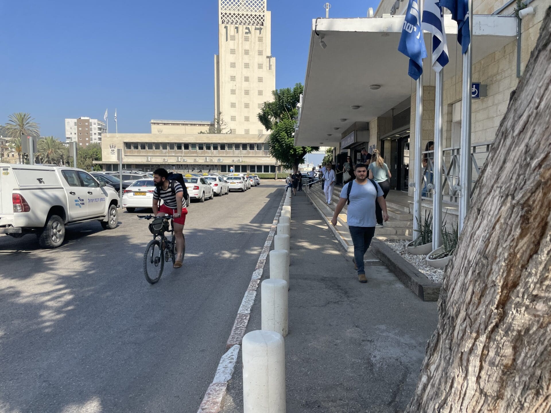Cyclist_outside_train_station_haifa_central
