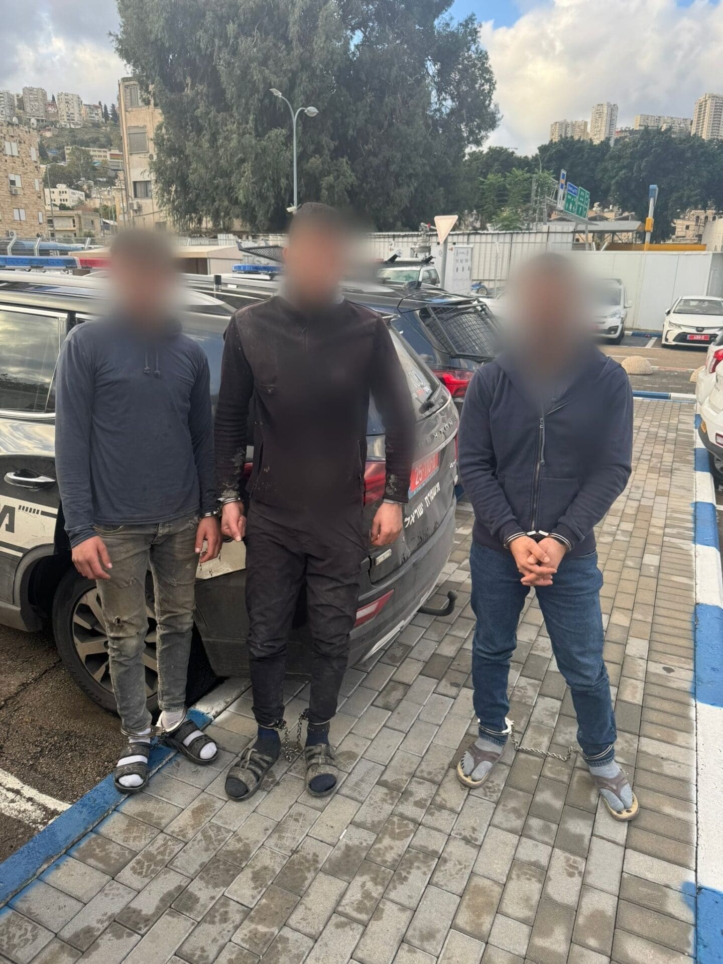 שוהים בלתי חוקיים בחיפה (צילום: משטרת ישראל)