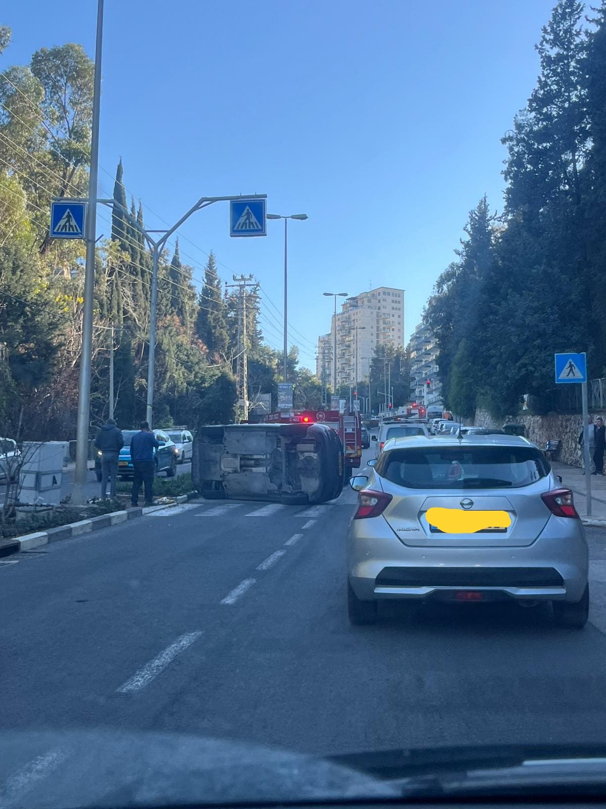 רכב התהפך בעליה של אינטרנציונל ברמות רמז (צילום: חי פה בשטח)