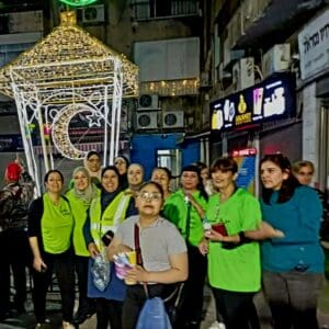 פעילי 'מרכז קהילתי חליסה' – מארגני התהלוכה בשנים עברו (צילום: אלבום פרטי, בהייה ג'ובראן קסיס)
