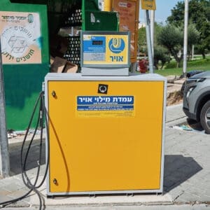 עמדת מילוי אוויר, מדחס, צמיג, מכונית, רכב, ציוד שירות, תחנת דלק, צהוב, טכני שירות עצמי