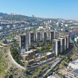 הוועדה המחוזית הורתה על שינויים מהותיים בתוכנית ההתחדשות העירונית בנשר הוועדה המחוזית הורתה על שינויים מהותיים בתוכנית ההתחדשות העירונית בנשר - הדמיה התחדשות עירונית פינוי בינוי מעלה הגיבורים 16/6/26 (צילום: גיורא גור ושות׳ אדריכלים בע״מ)