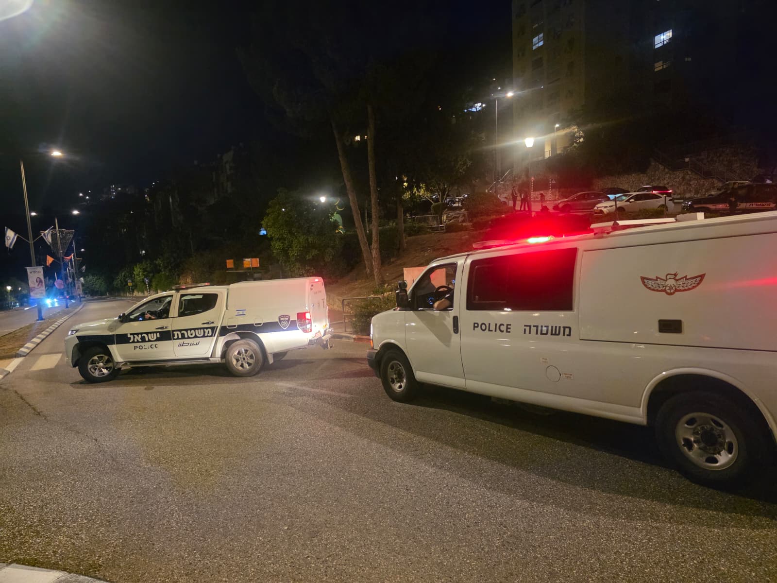 פיצוץ ברחוב צה״ל בנשר: פריט אמל״ח הושלך לעבר רכב, אדם נפצע - מצ״ב תיעוד 19/6/26 (צילום: דוברות המשטרה)