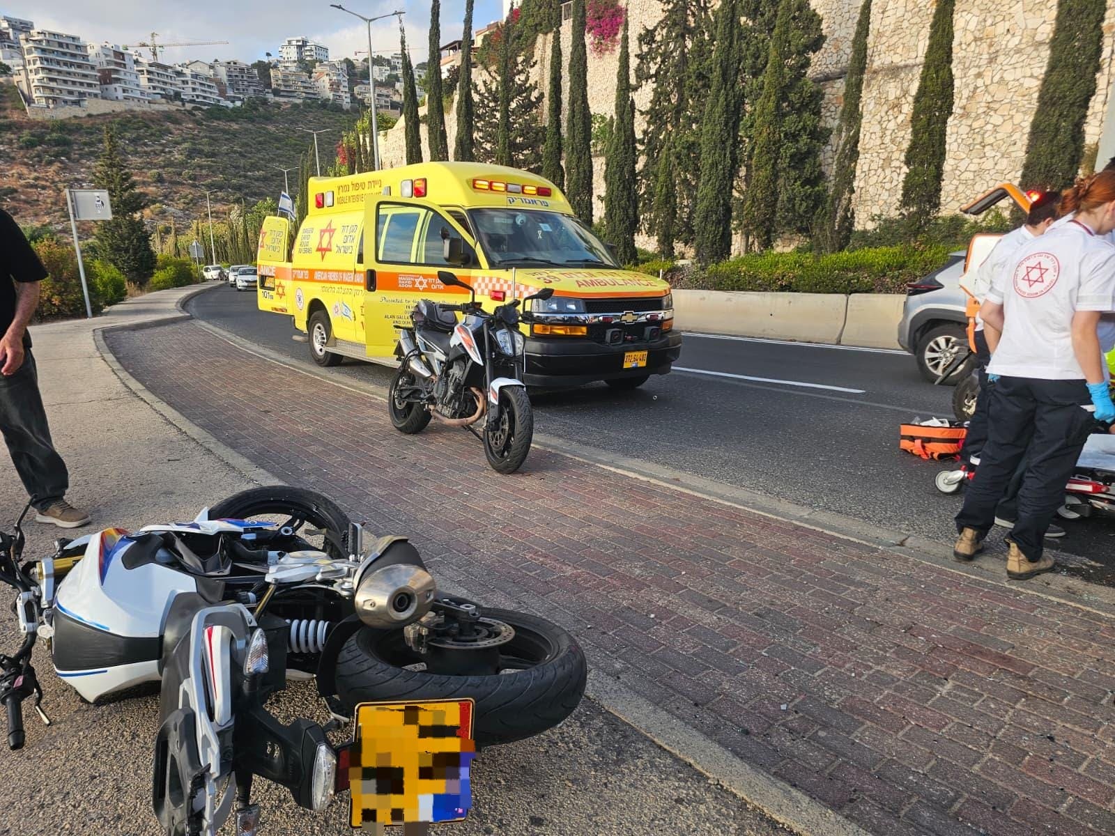 רוכב אופנוע נפצע קשה בתאונה עצמית בדרך פרויד בחיפה 21/6/26 (צילום: תיעוד מבצעי מד״א)