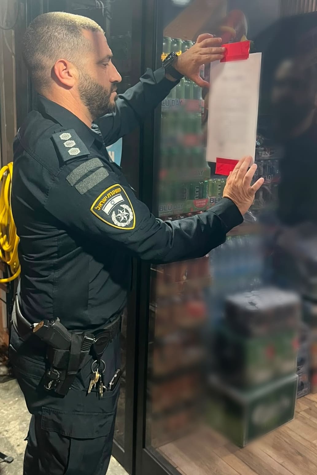 בעקבות הרצח בחיפה: שלושה בתי עסק ברחוב העצמאות נסגרו בצווים מנהליים - מצ״ב תיעוד 3/7/26 (צילום: דוברות המשטרה)