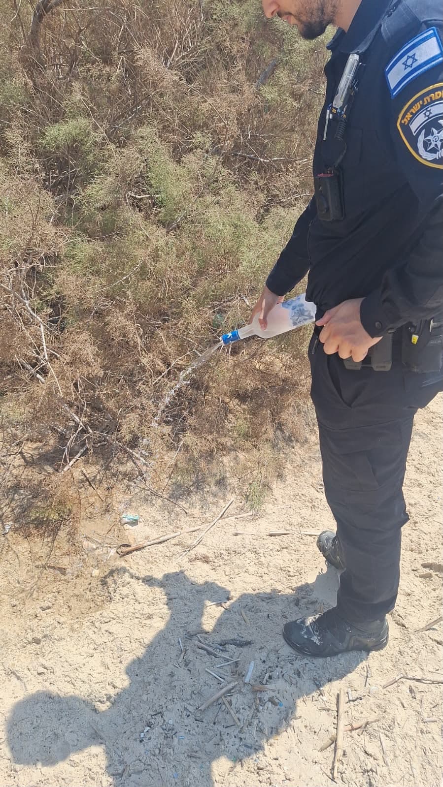 פעילות משטרתית מוגברת בחופי חיפה: דוחות, שפיכות אלכוהול ועיכוב חשודים 17/8/26 (צילום: דוברות המשטרה)